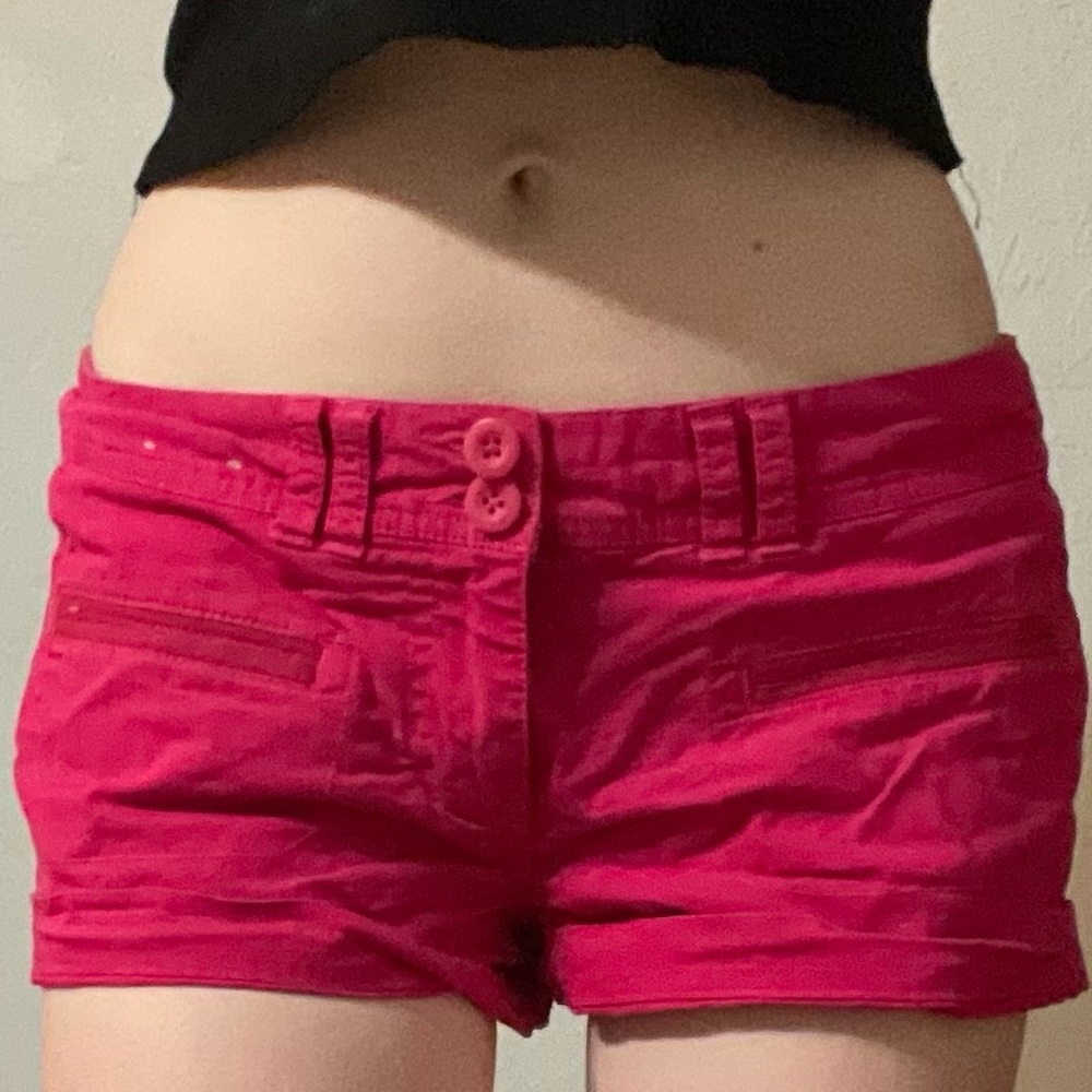 Hot pink low waisted Arizona shorts.